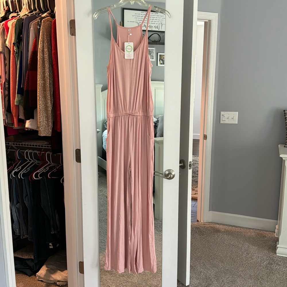 Pink jumpsuit with pockets, with tags